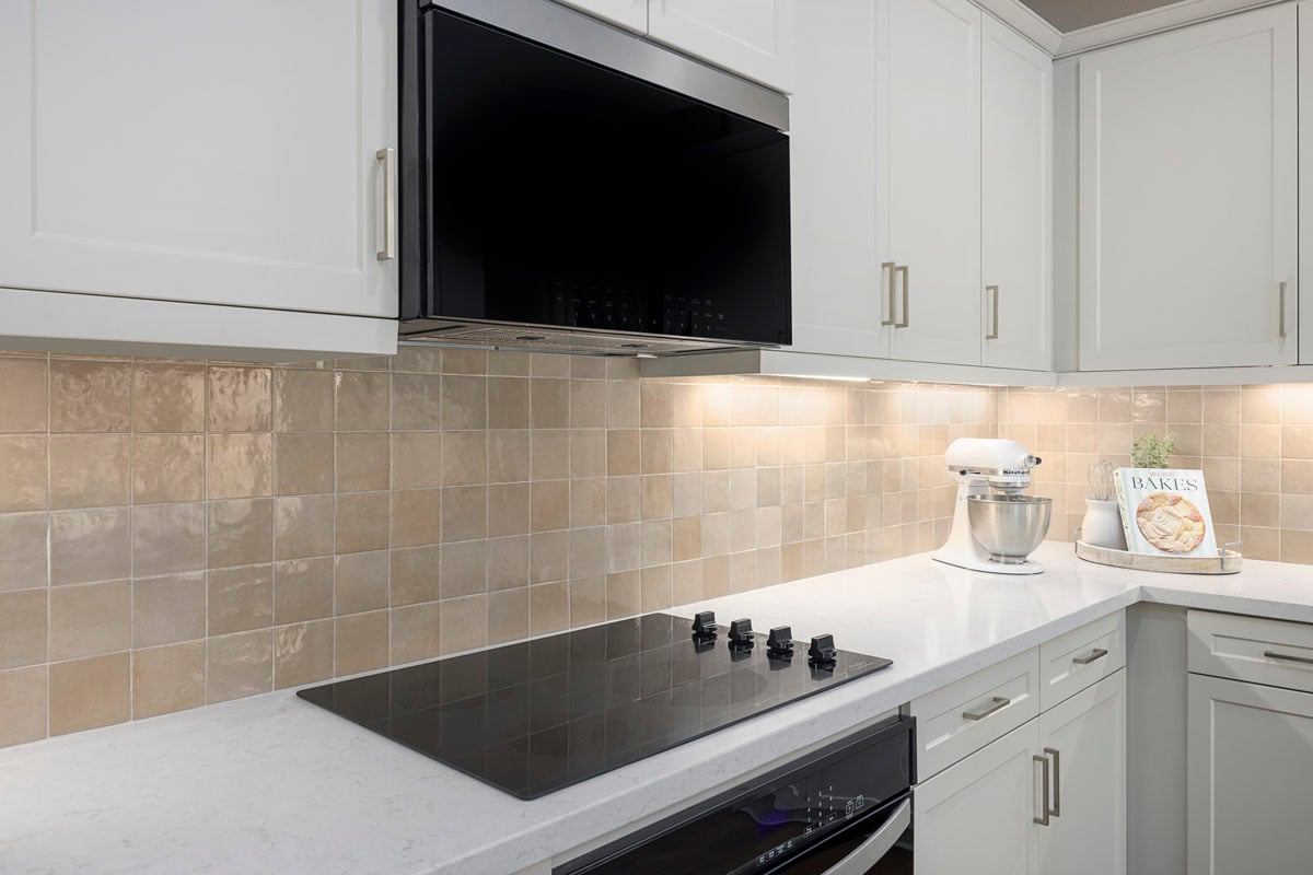 Optional quartz countertops and custom tile backsplash