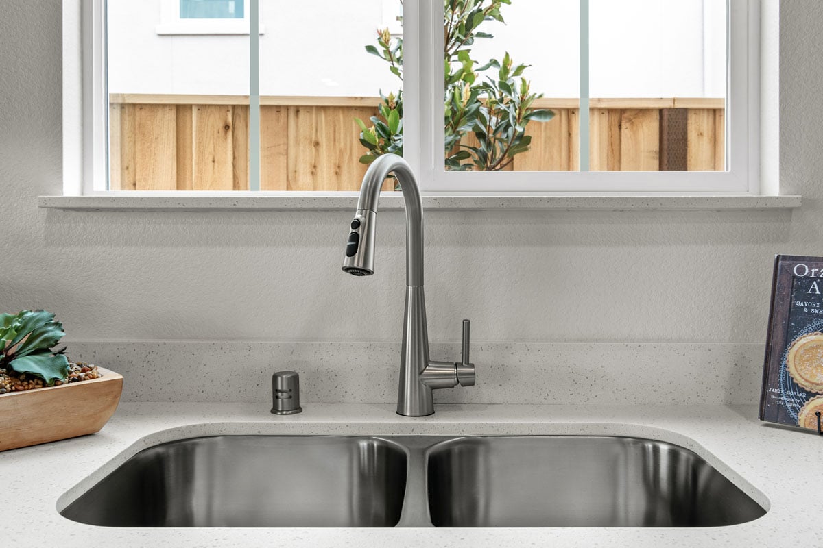 Double-basin stainless steel kitchen sink