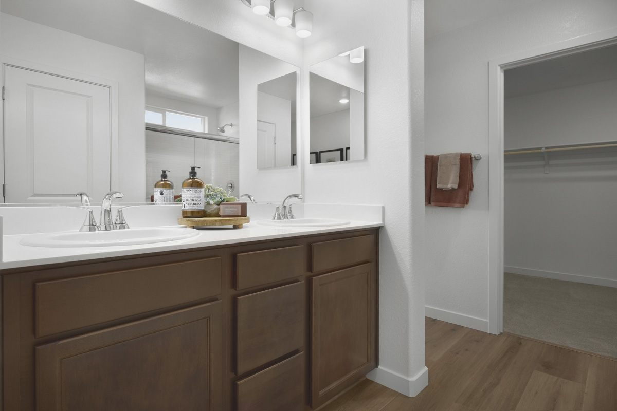 Solid-surface countertops at primary bath