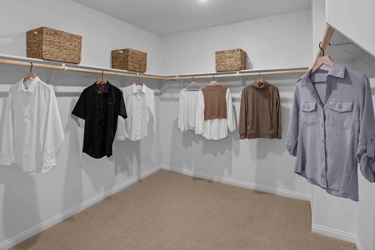 Large walk-in closet at primary bedroom