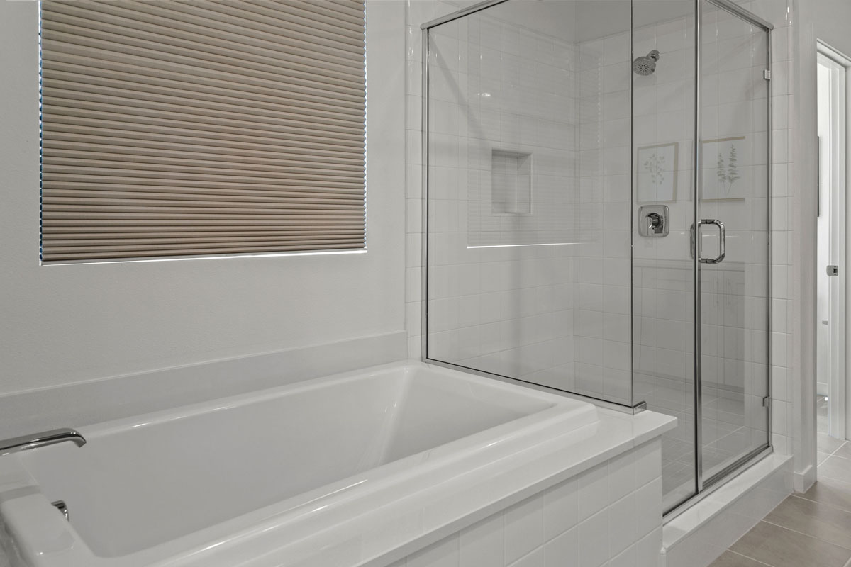Acrylic tub and separate shower at primary bath
