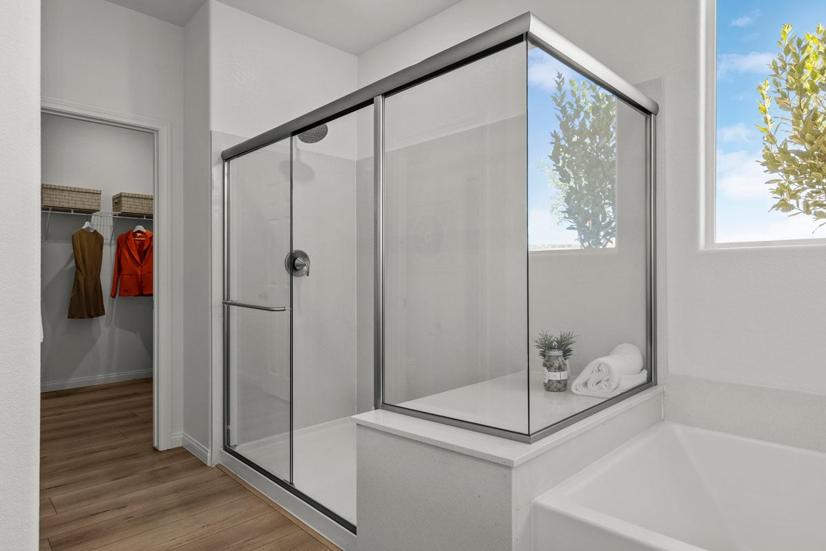 Enlarged shower with seat at primary bath