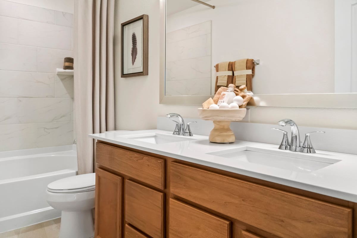 Dual-sink vanity at primary bath